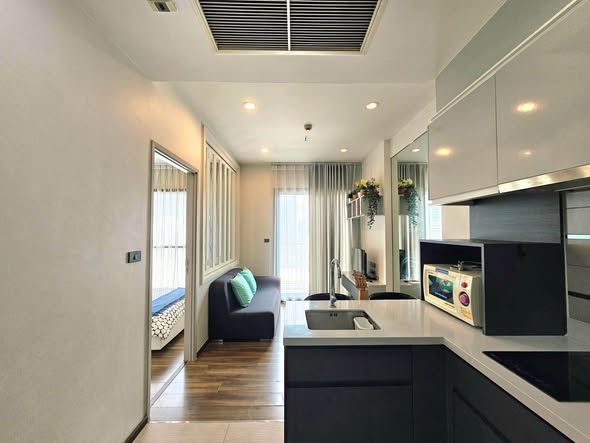 living room and kitchen of WYNE by Sansiri