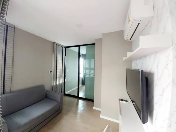 living room and room interior of Wynn Condo Chokchai 4
