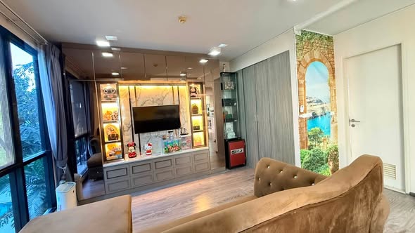bedroom and living room of Zelle Rattanathibet 2