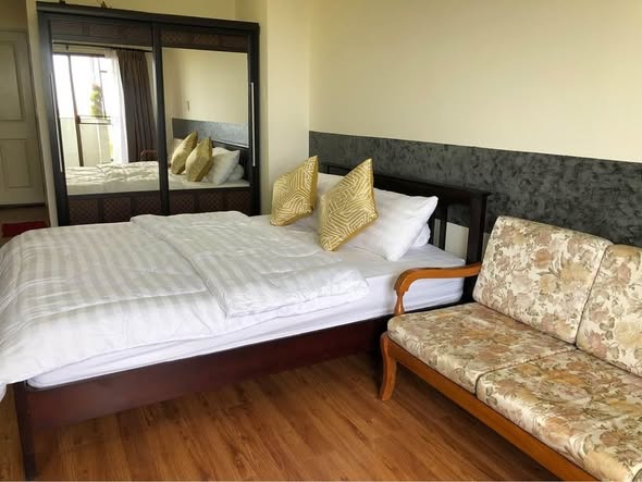 bedroom of 103 Central condominium
