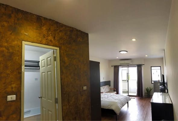 bedroom of 103 Central condominium
