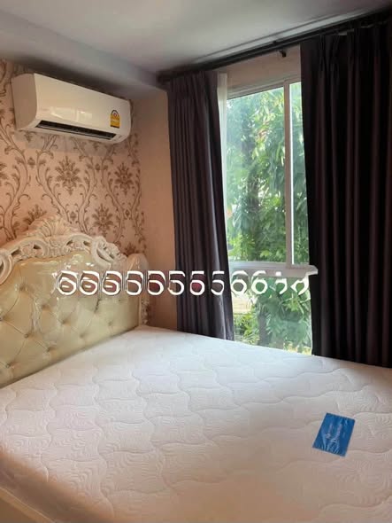 bedroom of พลัมคอนโด โชคชัย 4