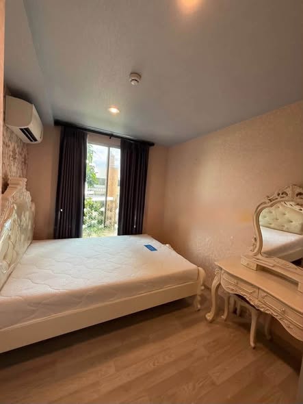 bedroom of พลัมคอนโด โชคชัย 4