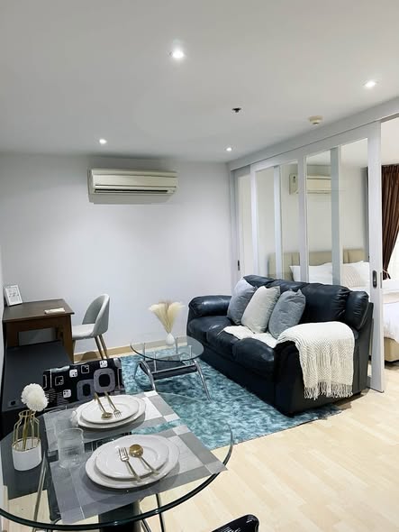 bedroom and living room of 59 Heritage