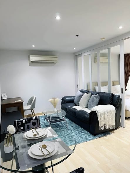 bedroom and living room of 59 Heritage