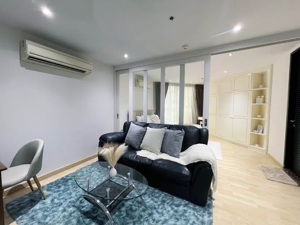 living room and bedroom of 59 Heritage