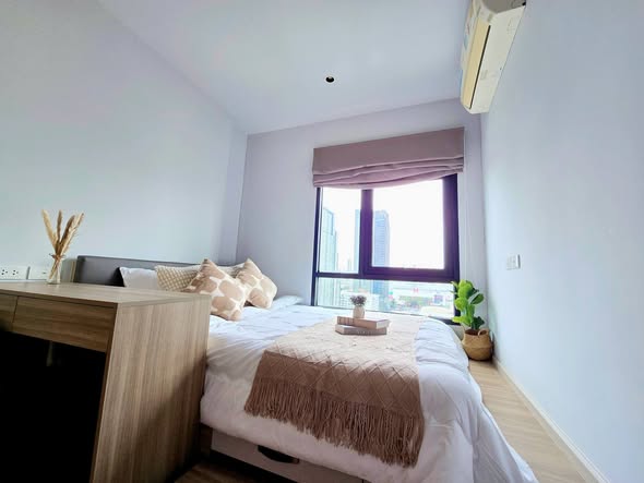 bedroom of Altitude Unicorn Sathorn