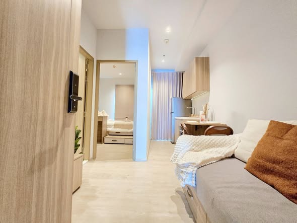 living room and bedroom of Altitude Unicorn Sathorn