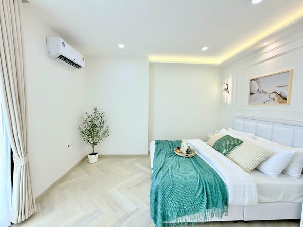 bedroom of Apple Condominium
