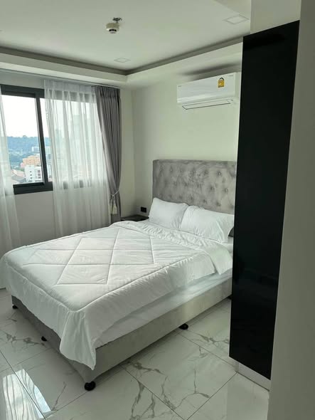 bedroom of Arcadia Millennium Tower