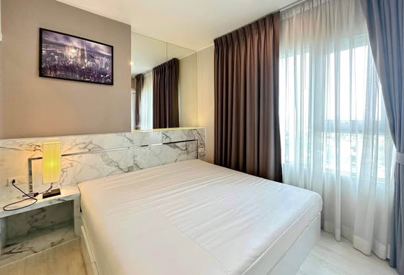 bedroom of Aspire Sathorn – Tha Phra