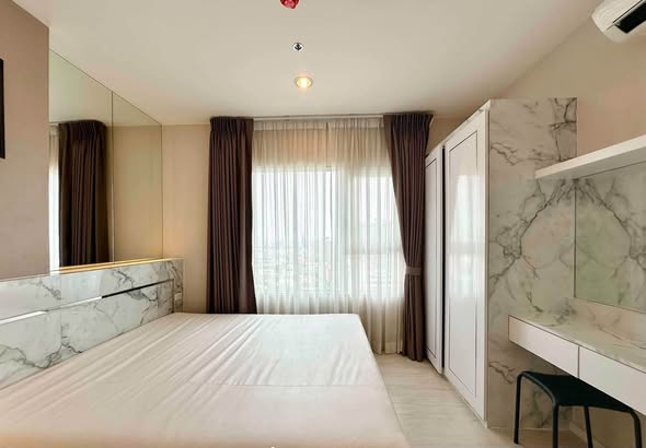 bedroom of Aspire Sathorn – Tha Phra