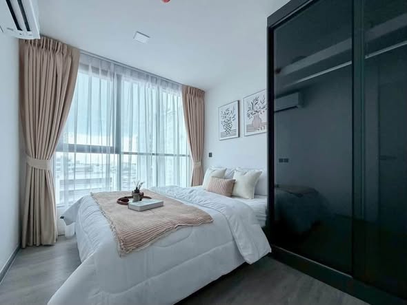bedroom and room interior of Atmoz Palacio Ladprao Wanghin | แอทโมซ พาลาซิโอ ลาดพร้าว วังหิน