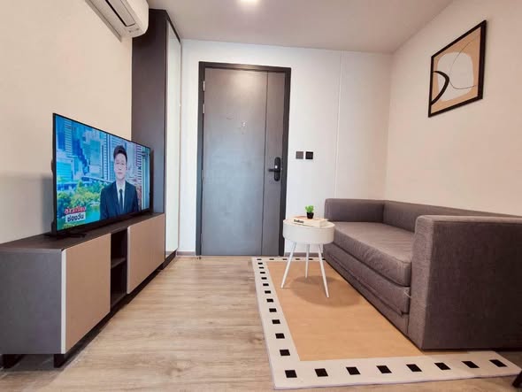 living room and room interior of Atmoz Palacio Ladprao Wanghin | แอทโมซ พาลาซิโอ ลาดพร้าว วังหิน