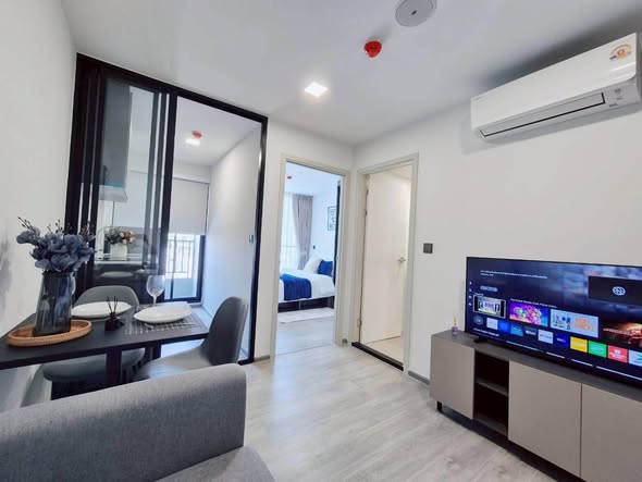 living room and room interior of Atmoz Palacio Ladprao Wanghin | แอทโมซ พาลาซิโอ ลาดพร้าว วังหิน