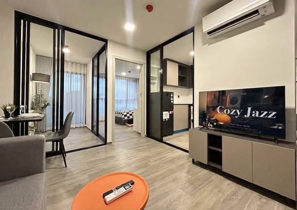 living room and room interior of Atmoz Palacio Ladprao Wanghin | แอทโมซ พาลาซิโอ ลาดพร้าว วังหิน