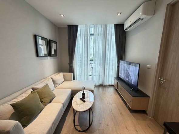 bedroom and living room of BEATNIQ