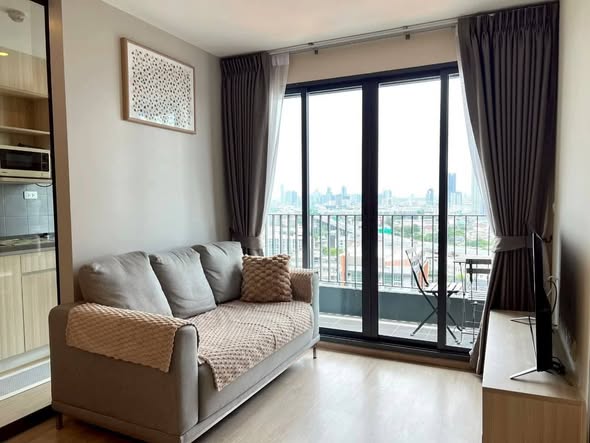 bedroom and living room of ซอย ไอดีโอ โอทู