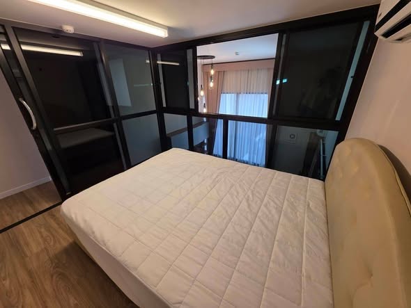 bedroom of Blossom Condo at Fashion Altitude