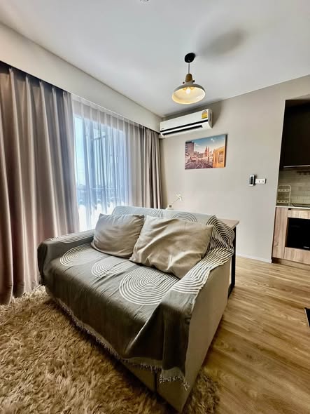 living room and bedroom of Blossom Condo Sathon-Charoen Rat