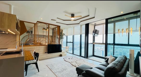 living room and bedroom of Canapaya Residences