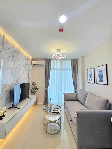 living room and bedroom of CC Condominium 1