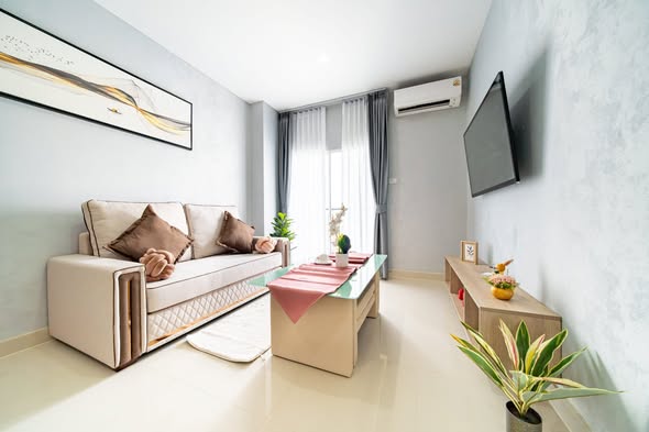 bedroom and living room of CC Condominium 2