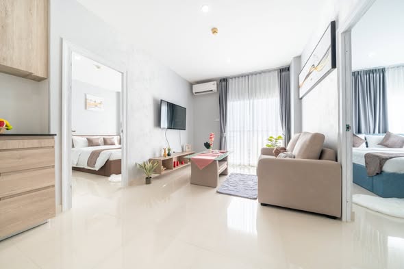 bedroom and living room of CC Condominium 2