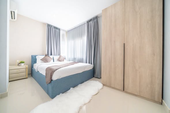bedroom and room interior of CC Condominium 2