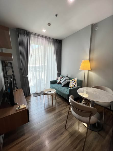 bedroom and living room of CEIL By Sansiri