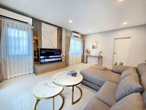 bedroom and living room of Centro Bangna