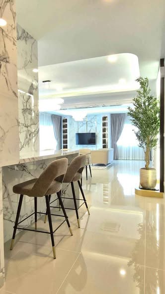 living room and kitchen of Centro Bangna