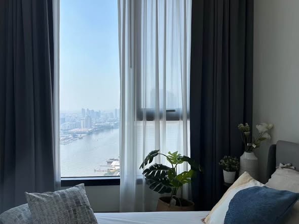 bedroom of Chapter Charoennakhon–Riverside