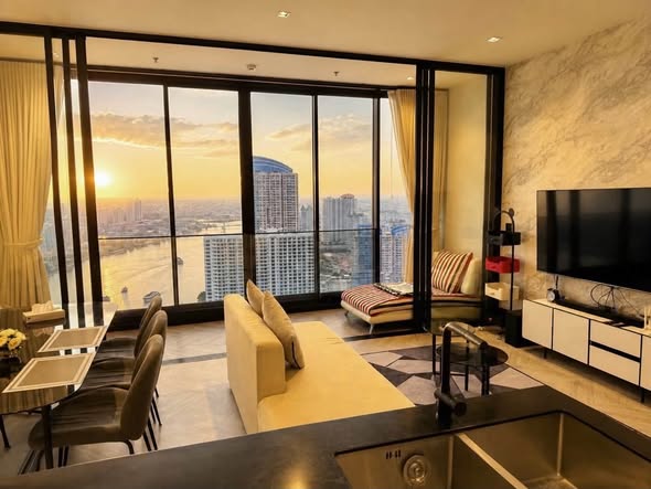living room and bedroom of Chapter Charoennakhon–Riverside