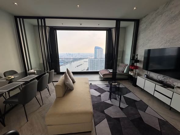 living room and bedroom of Chapter Charoennakhon–Riverside