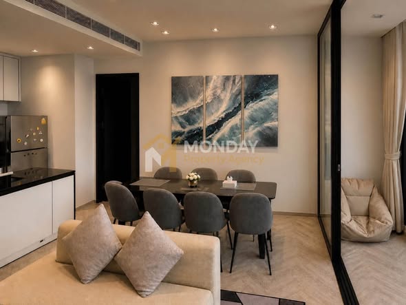 living room and bedroom of Chapter Charoennakhon–Riverside