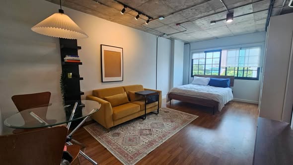 living room and bedroom of Condo One Thong Lo