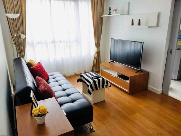 living room and bedroom of Condo One X