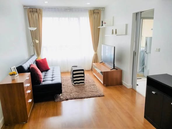 living room and bedroom of Condo One X