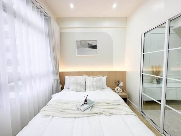 bedroom and room interior of Corn Condominium