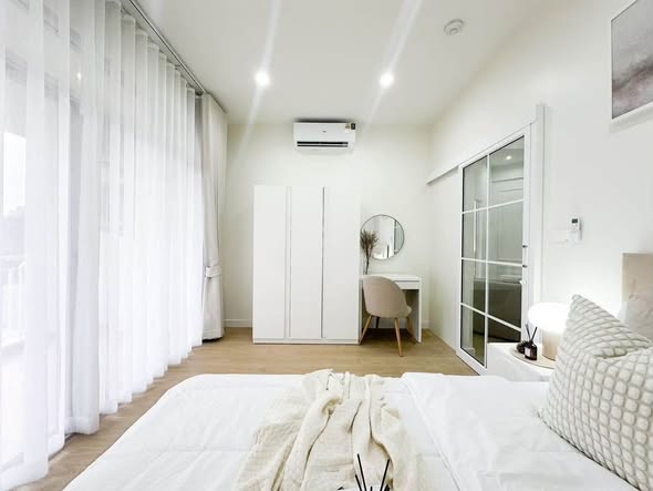 bedroom and room interior of Corn Condominium
