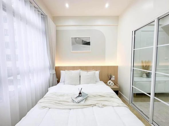 bedroom and room interior of Corn Condominium