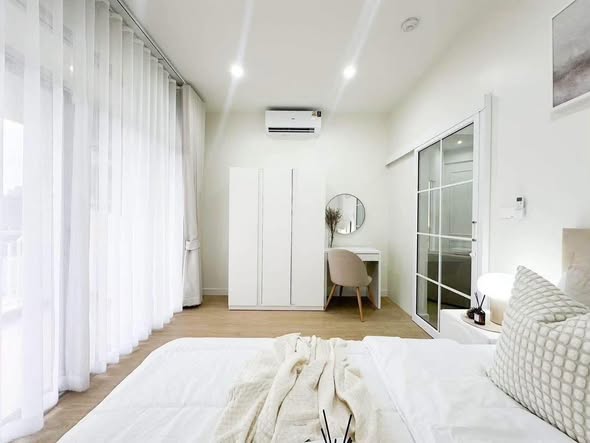 bedroom and room interior of Corn Condominium