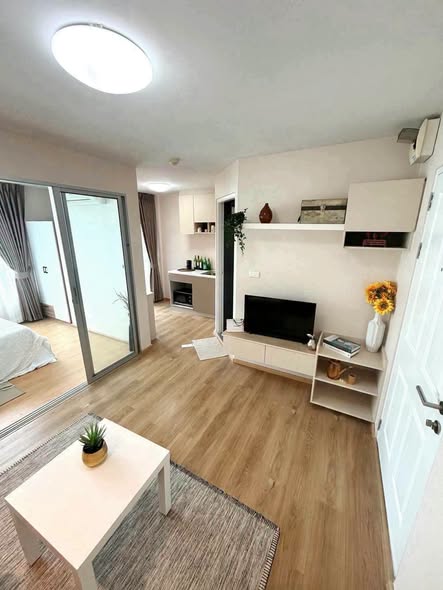 bedroom and living room of D Condo Rattanathibet