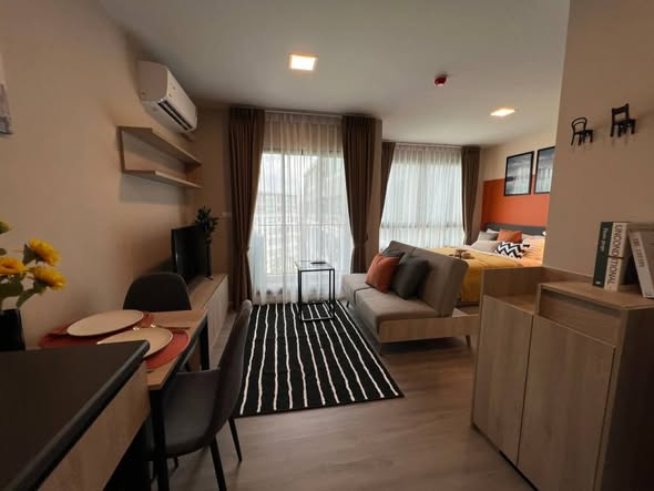 living room and bedroom of dcondo Campus Hideaway