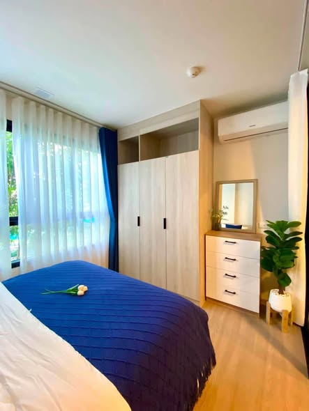 bedroom of dcondo Reef Phuket