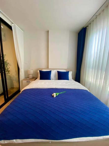 bedroom of dcondo Reef Phuket