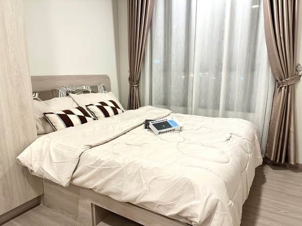 bedroom of dcondo Reef Phuket