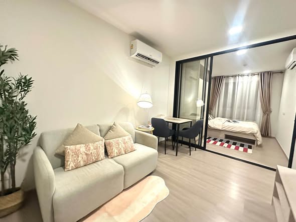 living room and bedroom of dcondo Reef Phuket