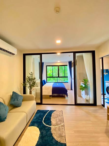 living room and bedroom and room interior of dcondo Reef Phuket